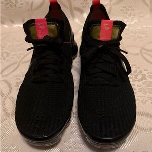 Nike Black Sneakers with Knit Upper and Bright Accents
